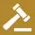 A white gavel is on top of a brown background.